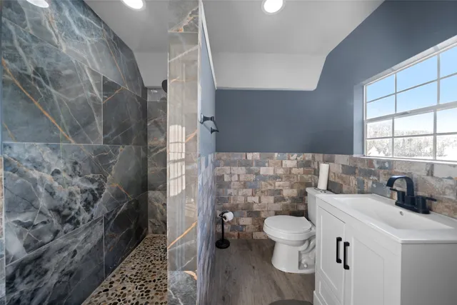 a view of a chairs and table in the outdoor room