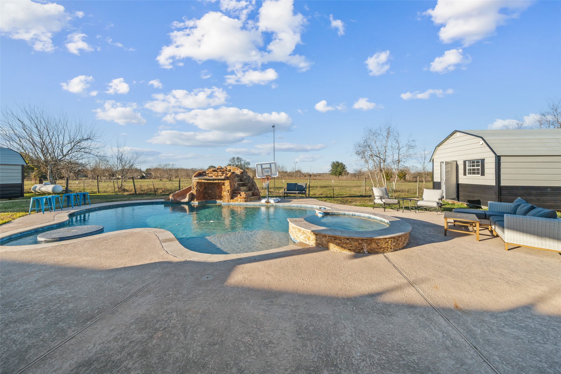 43910 Highway 290 Business Prairie View, TX 77484 - Photo 37 of 45 a swimming pool with outdoor seating and yard