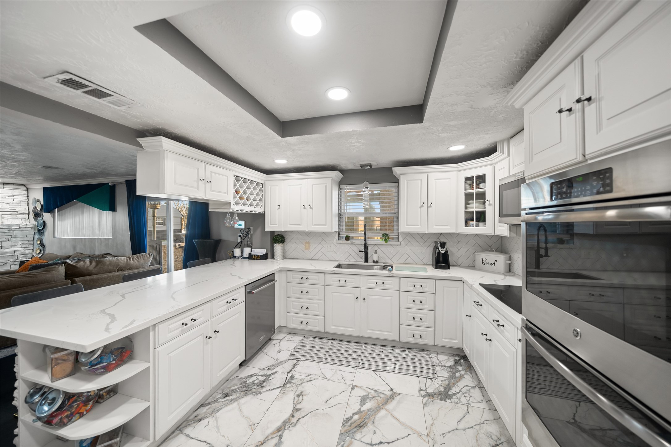 43910 Highway 290 Business Prairie View, TX 77484 - Photo 5 of 45 a large white kitchen with a stove a sink dishwasher and a refrigerator