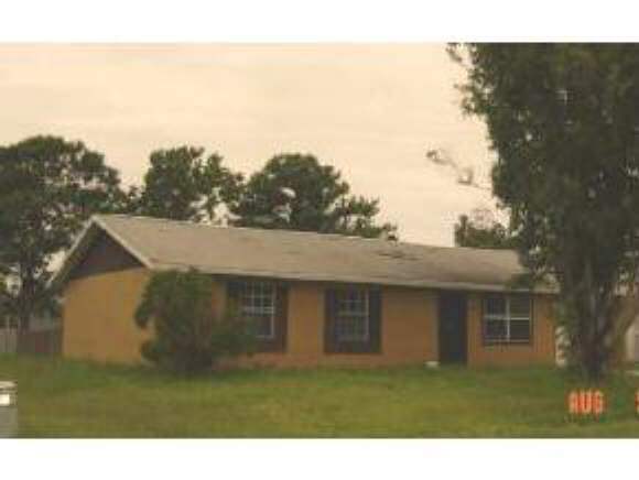1320 Northeast Creel Palm Bay, FL 32905 - Photo 1 of 2 a aerial view of a house