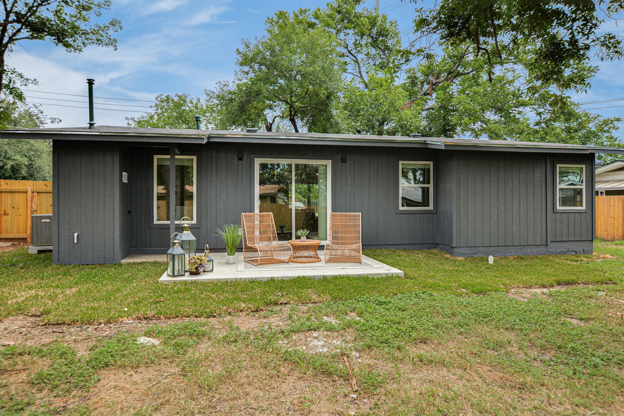4505 Kitty Avenue Austin, TX 78721 - Photo 11 of 11 A secluded patio provides an intimate setting for outdoor leisure behind this appealing residence.