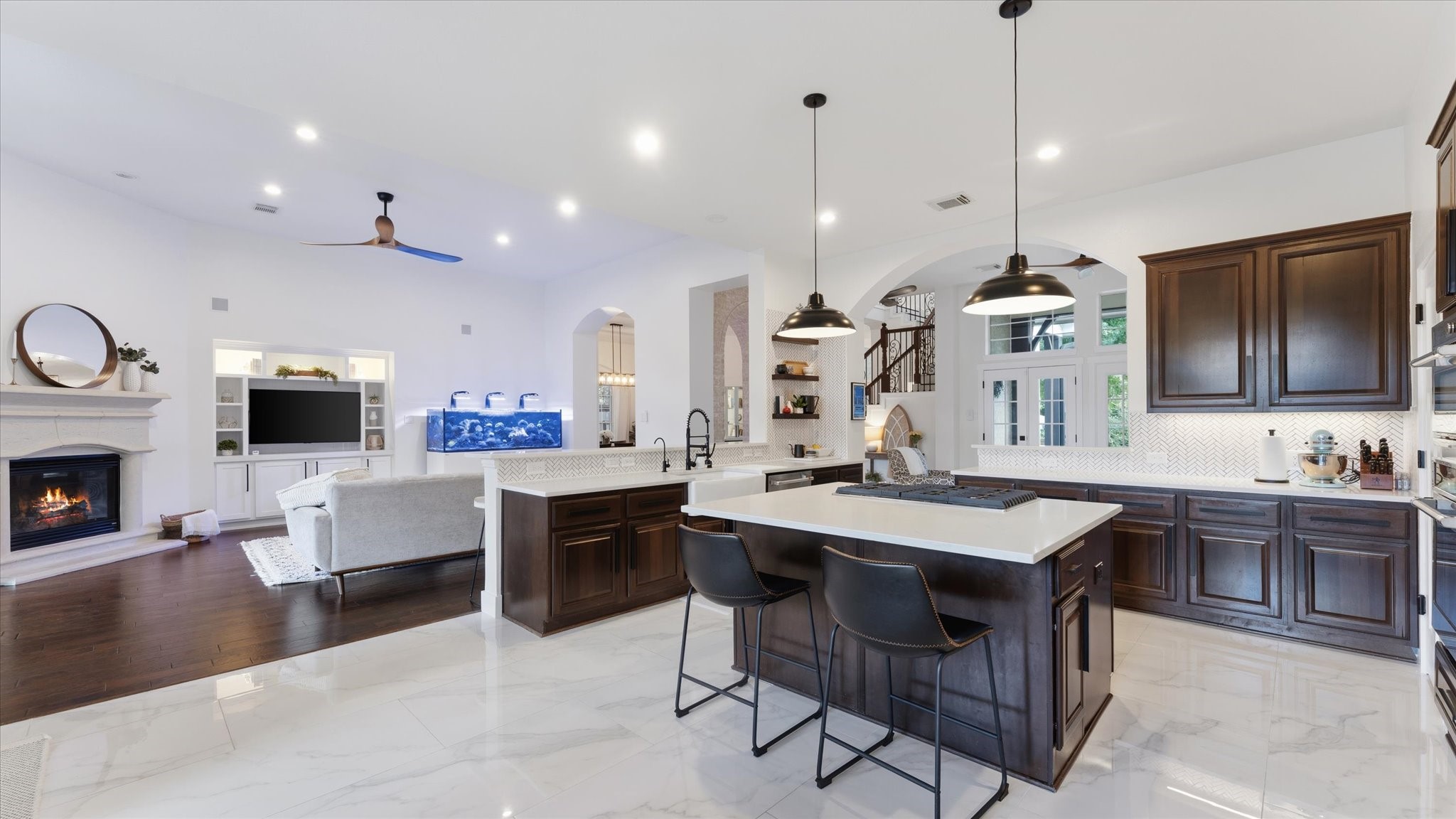 2 South Winsome Path Circle Spring, TX 77382 - Photo 18 of 47 a large kitchen with a table and chairs