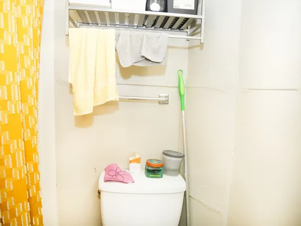 a bathroom with a sink and shower curtain