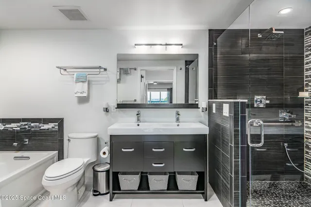 a kitchen with stainless steel appliances a refrigerator and a sink