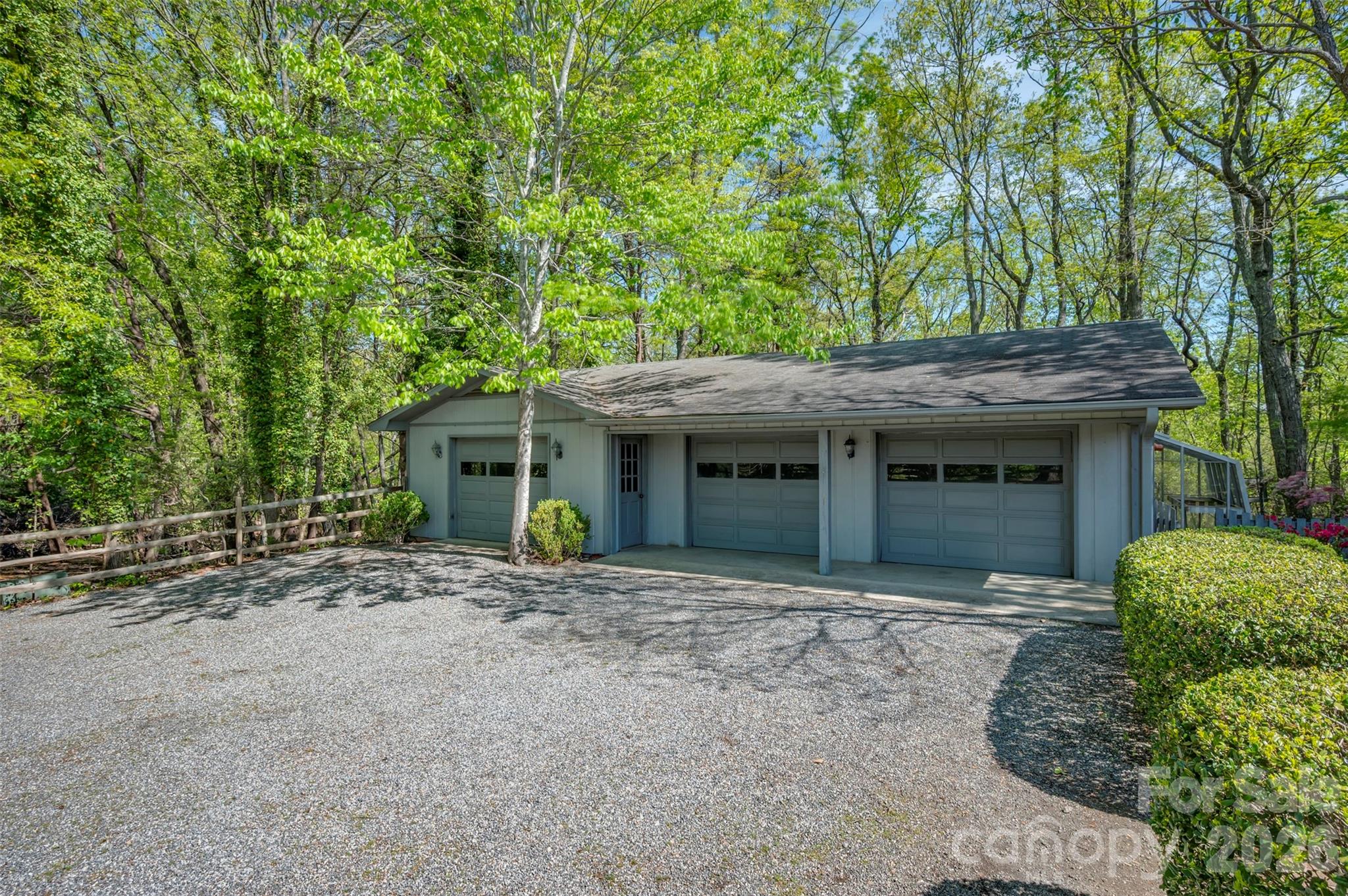 176 Fox Run Lane Tryon, NC 28782 - Photo 32 of 44 a front view of a house with a garden