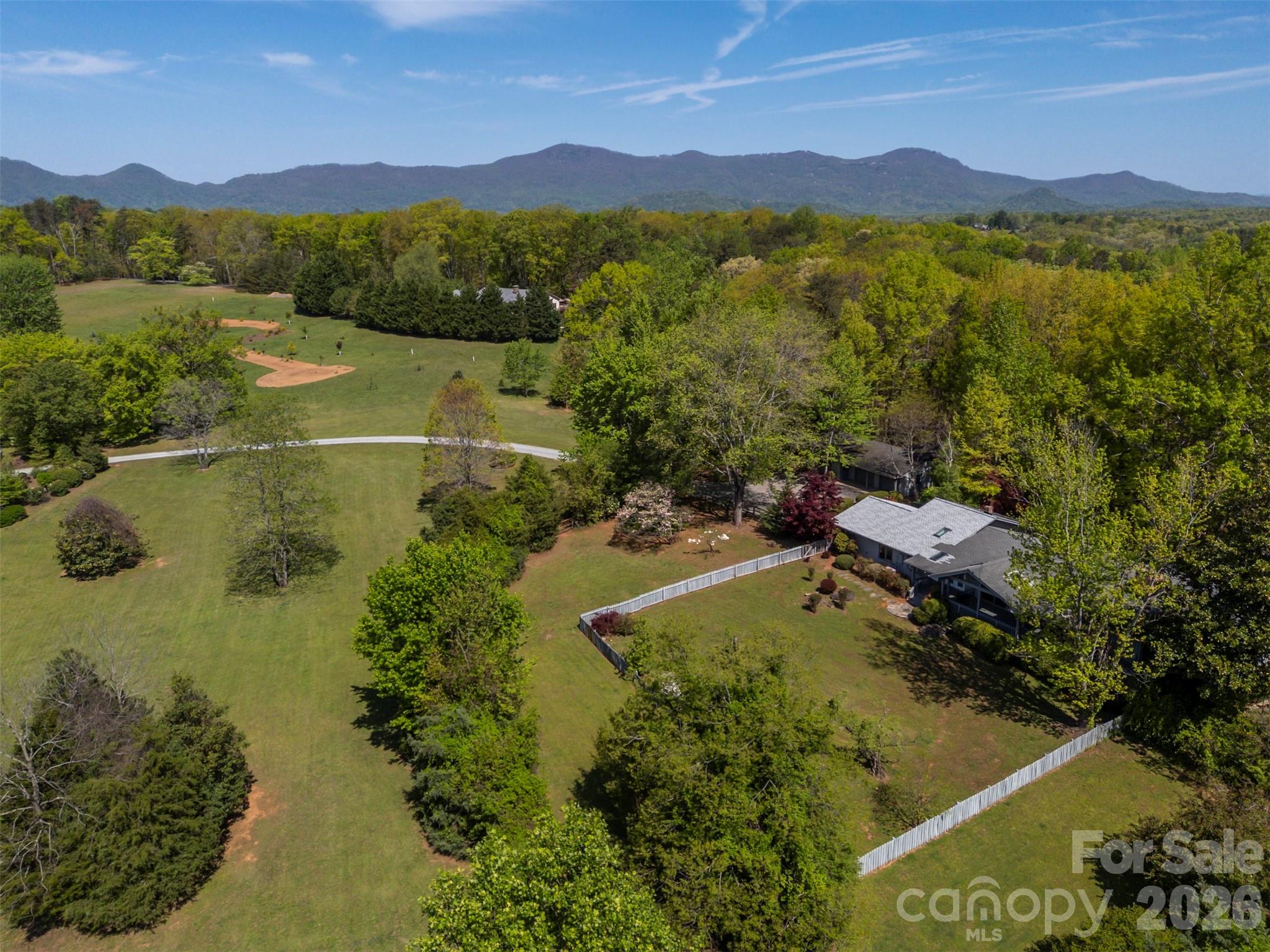 176 Fox Run Lane Tryon, NC 28782 - Photo 41 of 44 a view of a city with mountains in the background