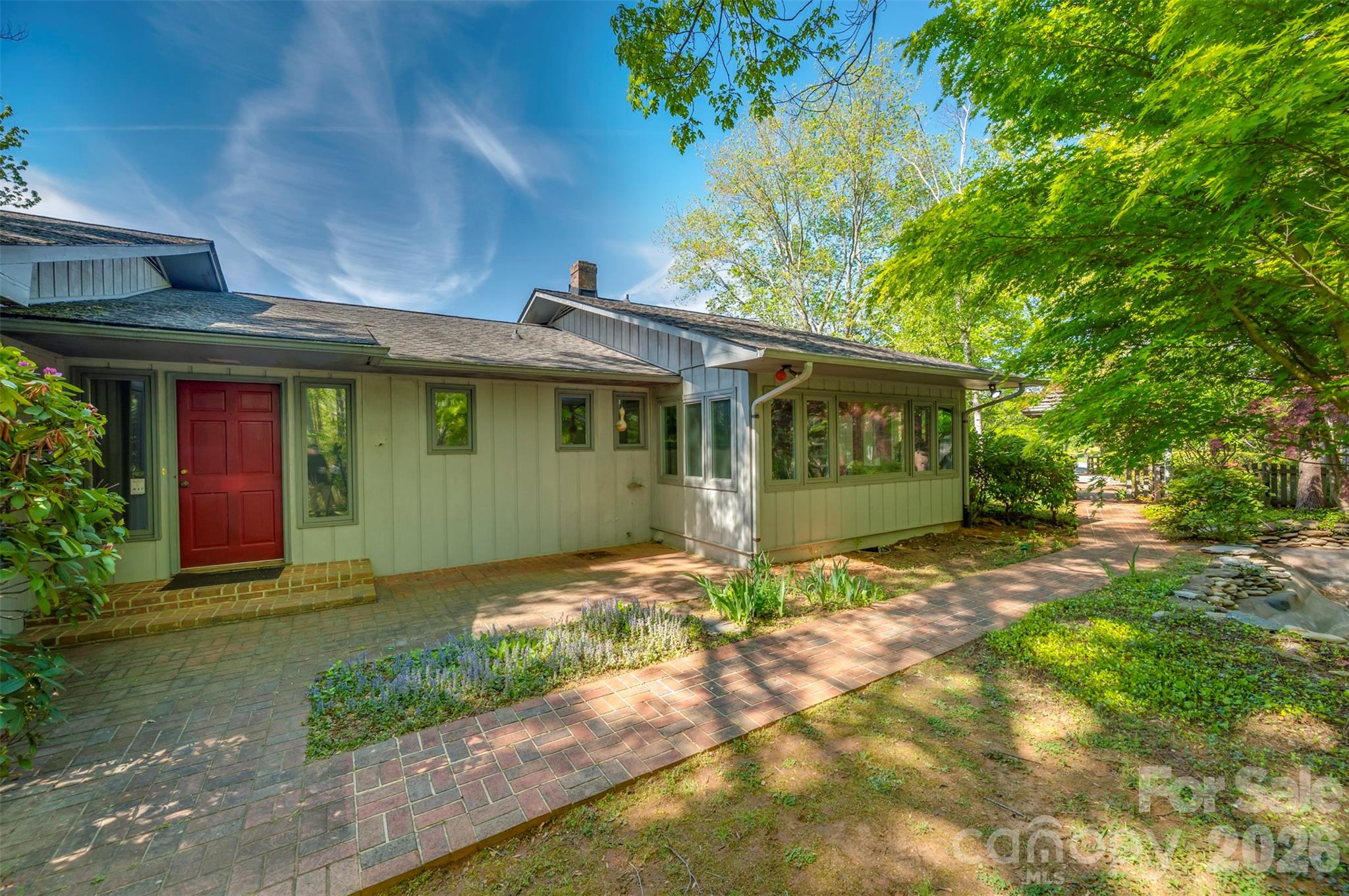 176 Fox Run Lane Tryon, NC 28782 - Photo 10 of 44 a view of a house with a yard