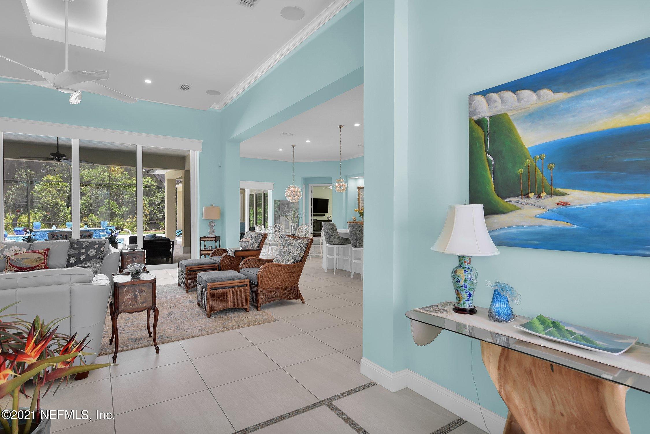496 Costa Del Sol Drive St. Augustine, FL 32095 - Photo 13 of 111 a living room with furniture and a potted plant
