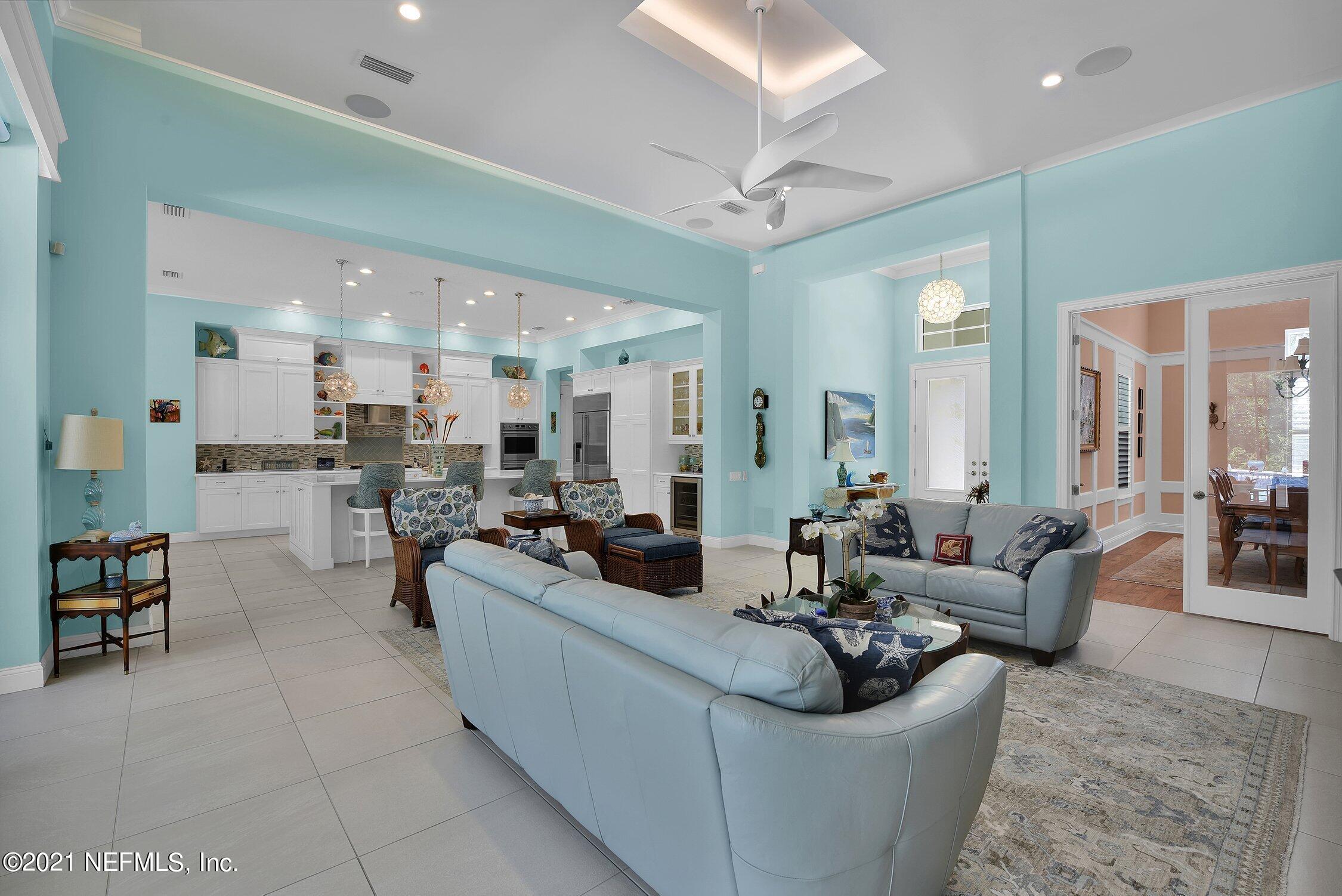 496 Costa Del Sol Drive St. Augustine, FL 32095 - Photo 20 of 111 a living room with furniture and a view of kitchen