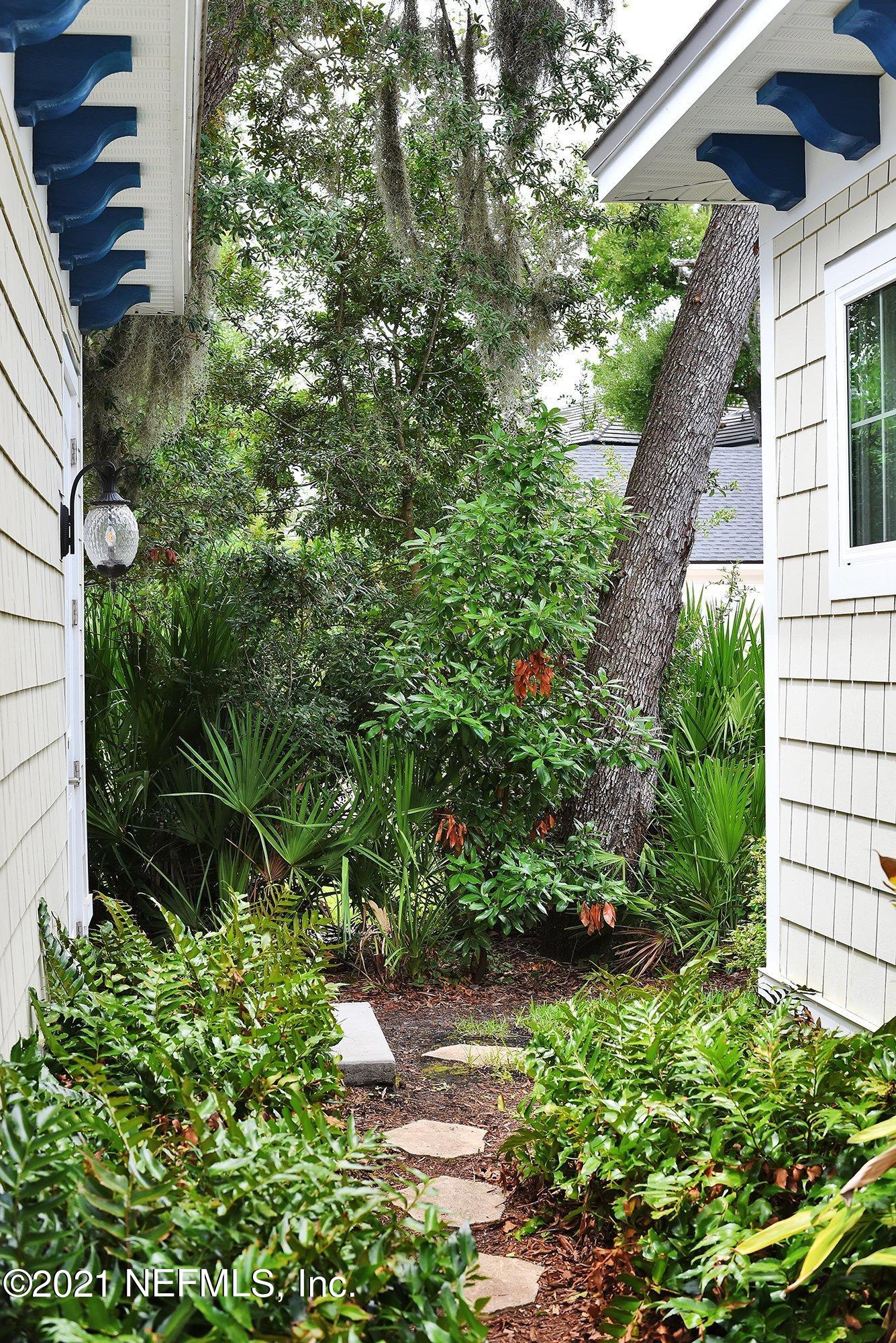 496 Costa Del Sol Drive St. Augustine, FL 32095 - Photo 8 of 111 a backyard of a house with lots of green space