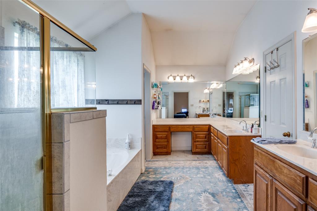 13420 Haslet Court Haslet, TX 76052 - Photo 14 of 26 a large kitchen with a large counter top appliances and cabinets