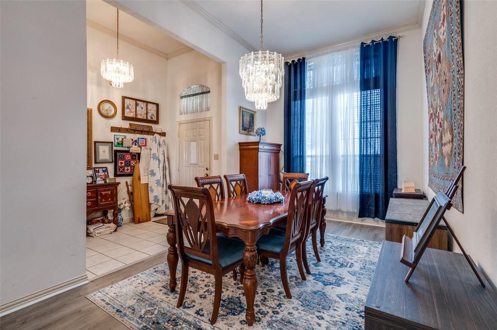 13420 Haslet Court Haslet, TX 76052 - Photo 4 of 26 a view of a dining room with furniture window and wooden floor