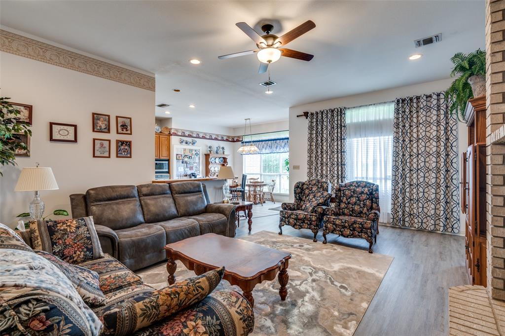 13420 Haslet Court Haslet, TX 76052 - Photo 5 of 26 a living room with furniture and wooden floor