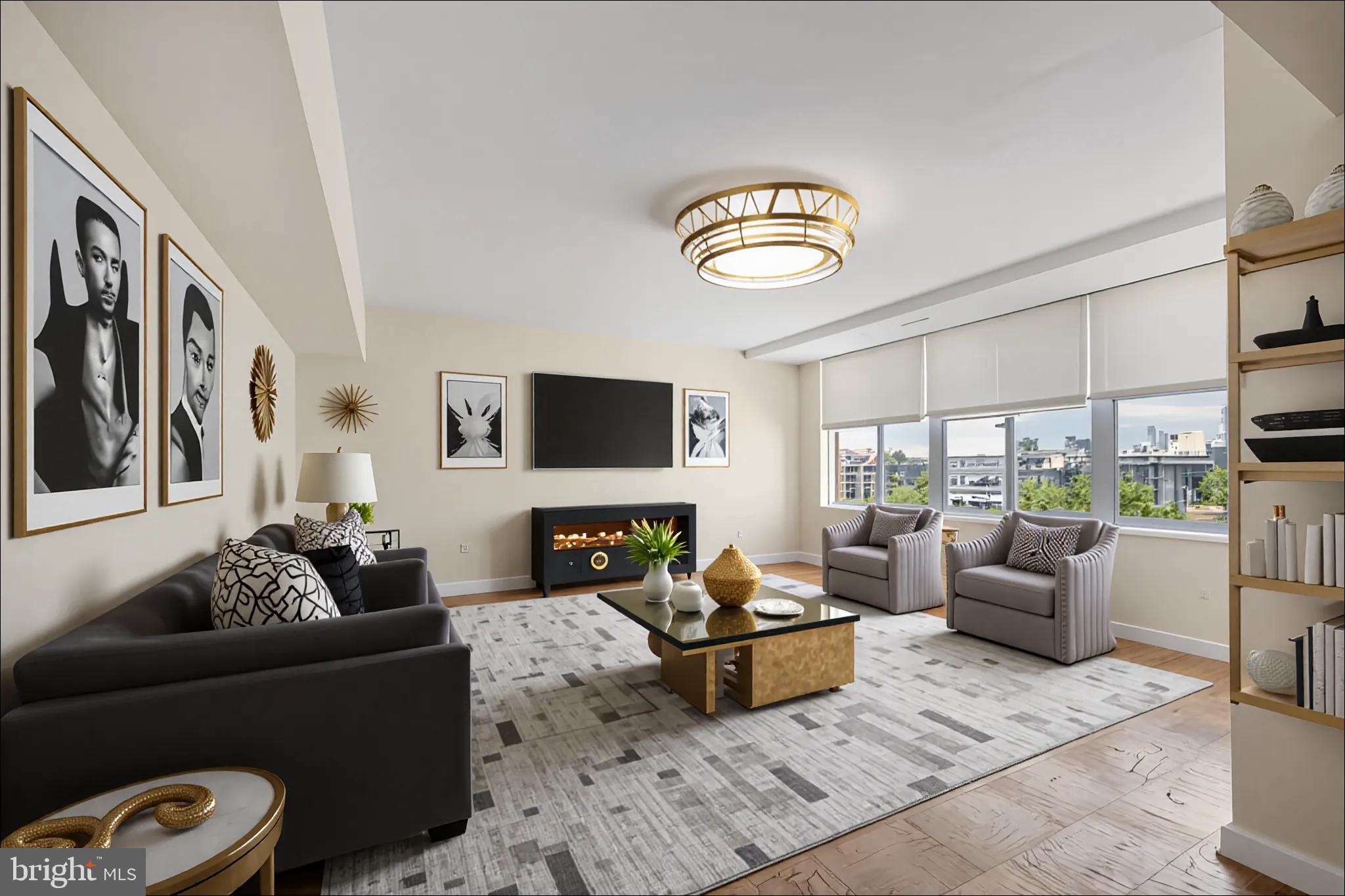 922 24th Street Northwest, Unit 809 Washington, DC 20037 - Photo 2 of 17 a living room with furniture fireplace and a flat screen tv