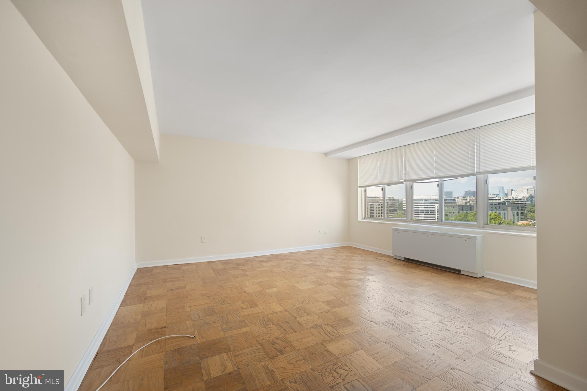 922 24th Street Northwest, Unit 809 Washington, DC 20037 - Photo 7 of 17 a view of an empty room with a window