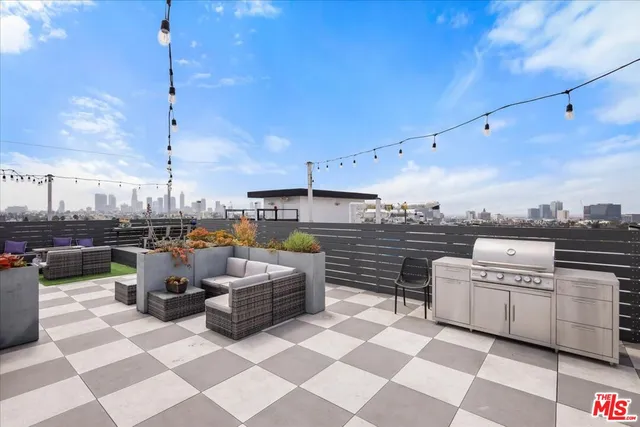 a living room with lots of furniture and appliances