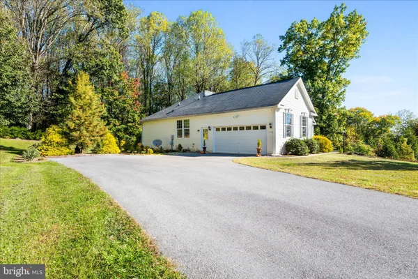 a house with trees in front of it