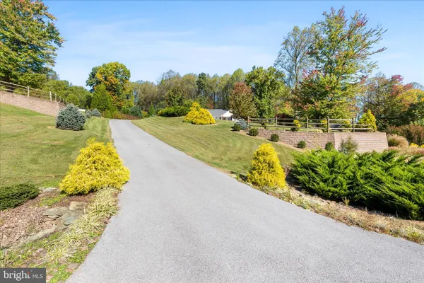 a view of a yard with an outdoor space