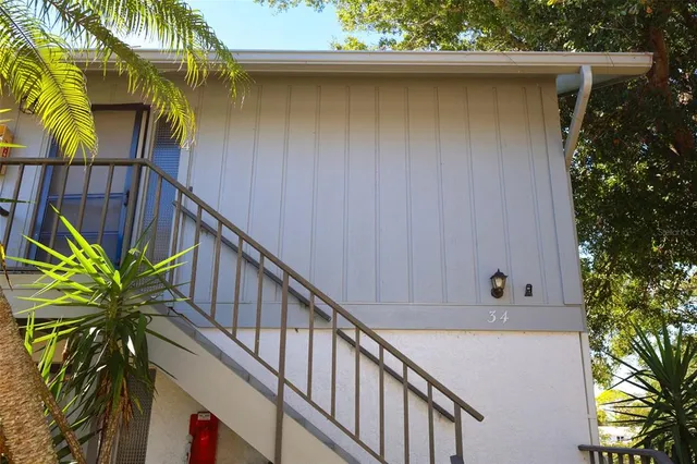 a view of balcony with wooden wall