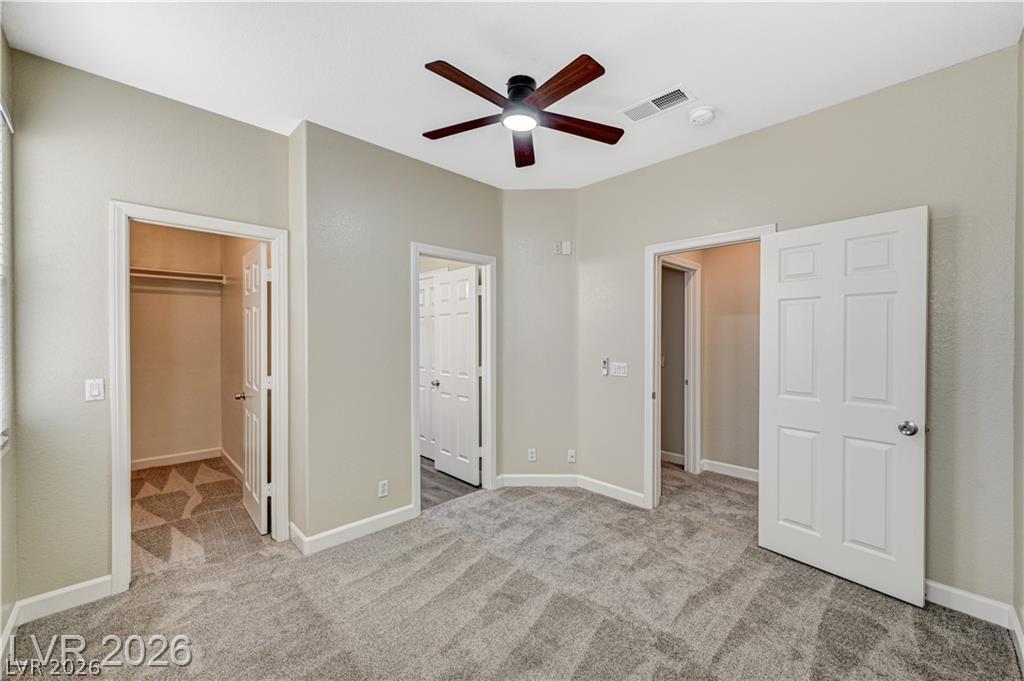 2283 Ramsgate Drive Henderson, NV 89074 - Photo 35 of 51 Soft carpeting underfoot creates a comfortable environment inside this spacious bedroom layout.
