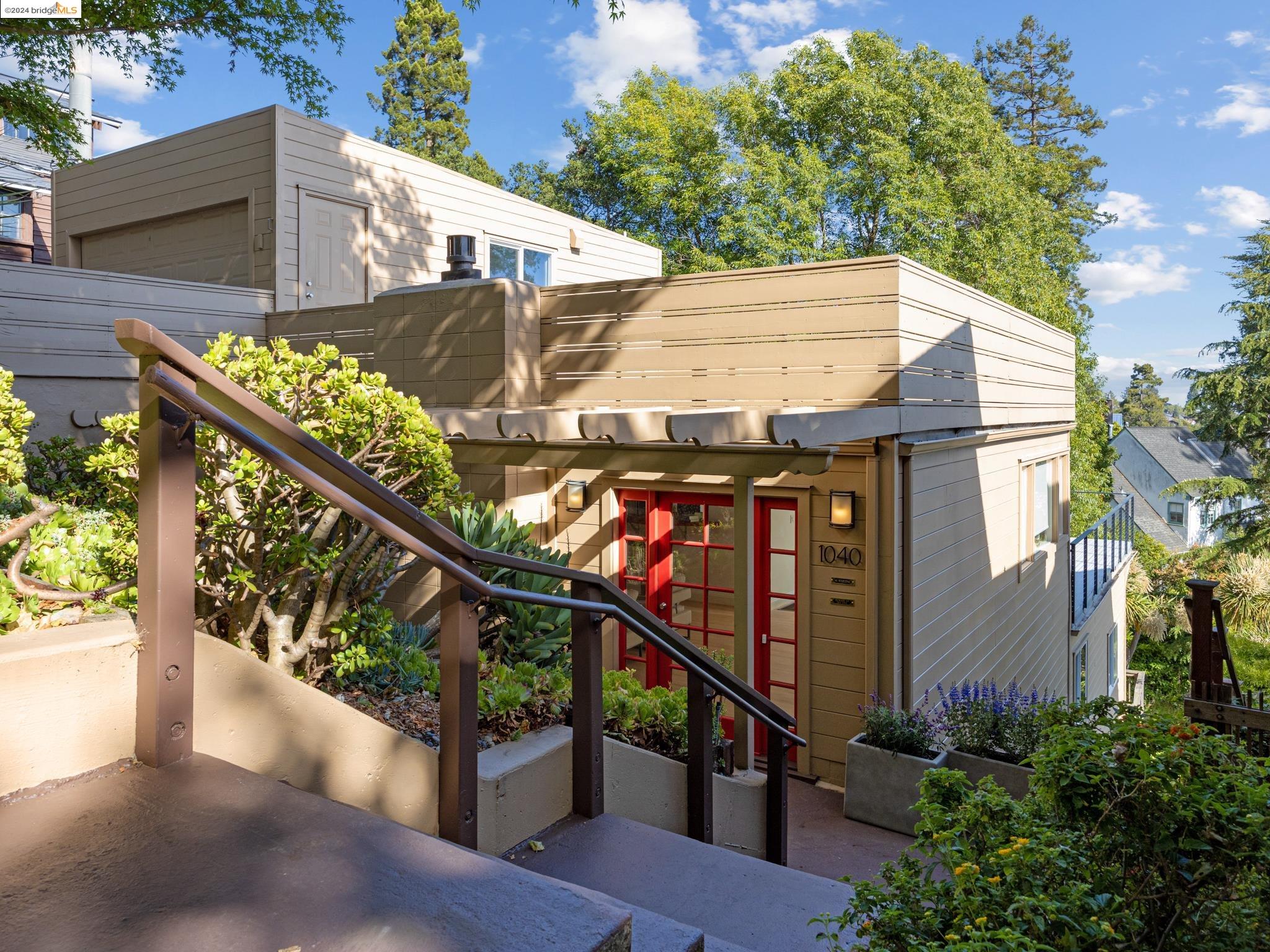 a view of a house with wooden stairs