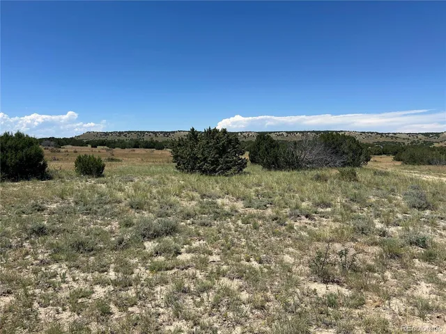 a view of a lake with a mountain in the background