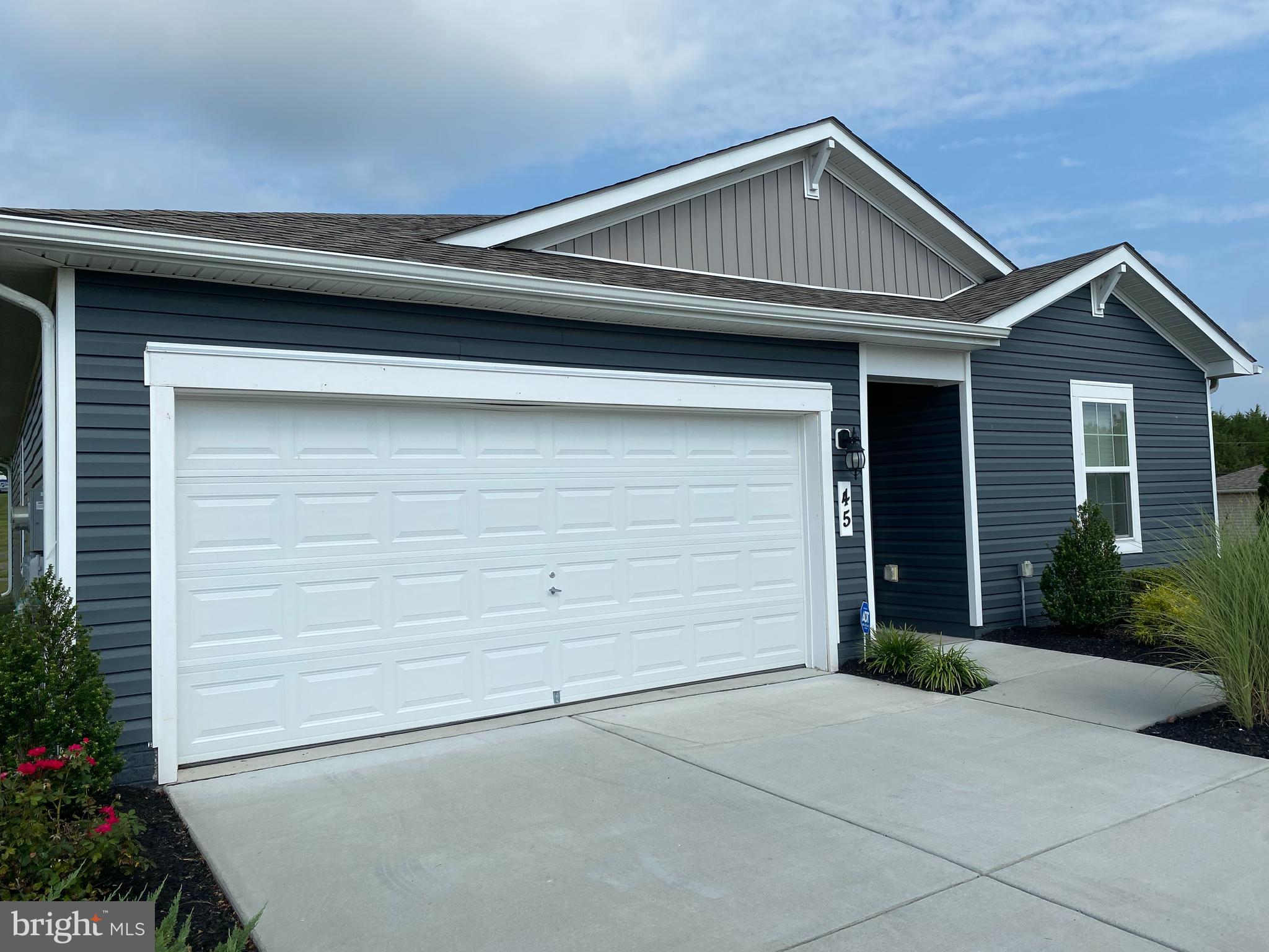 45 River Road Gettysburg, PA 17325 - Photo 2 of 15 a front view of a house with a yard and garage
