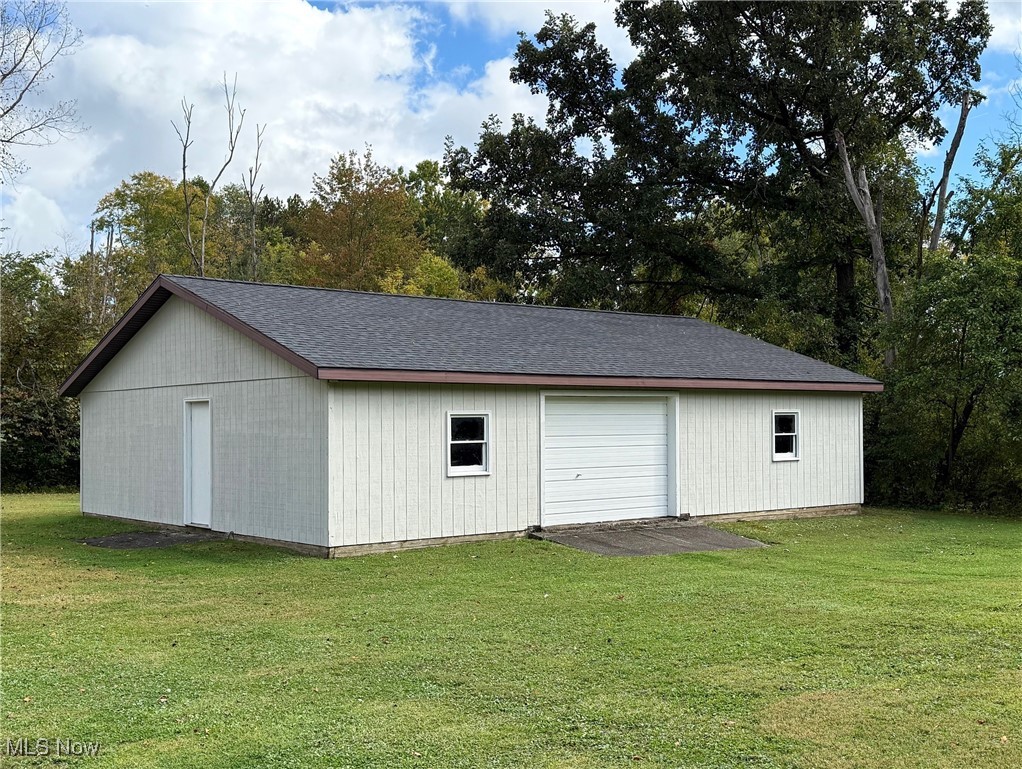 10263 Wye Road Chesterland, OH 44026 - Photo 34 of 45 Detached Garage just painted, awaiting your classic cars to store in or for the self-employed, construction or landscaping business.