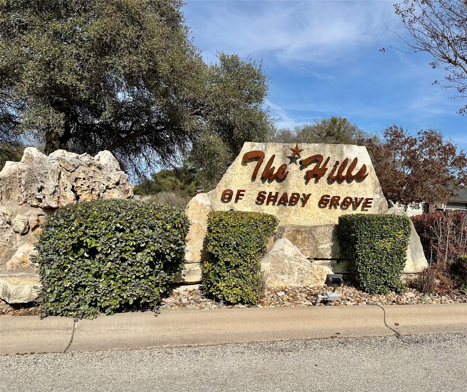 Lot 24 Andy's Point Burnet, TX 78611 - Photo 15 of 15 a sign that is sitting in front of a white house