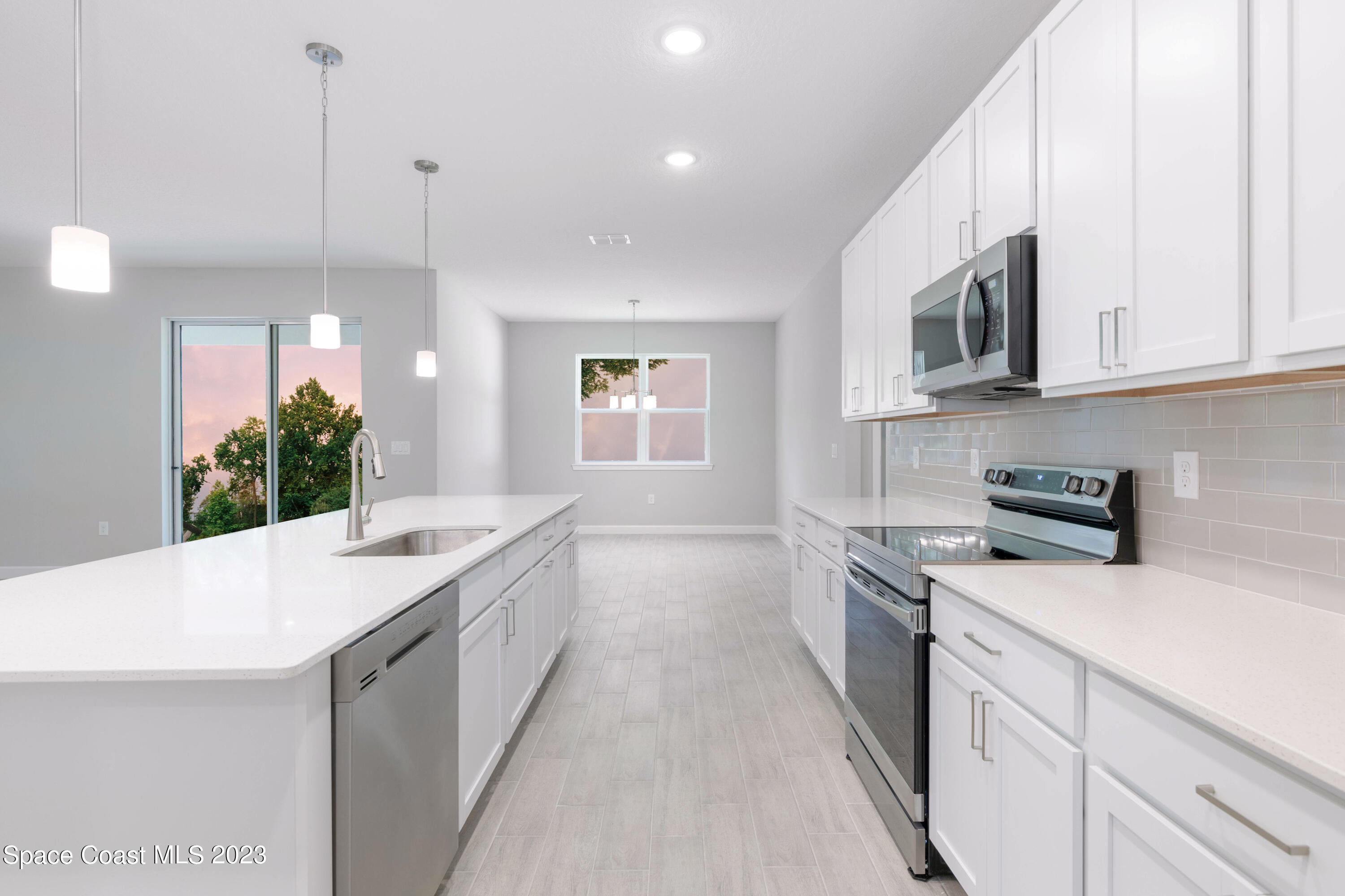 893 Titan Road Southeast Palm Bay, FL 32909 - Photo 7 of 20 Kitchen + Dinette