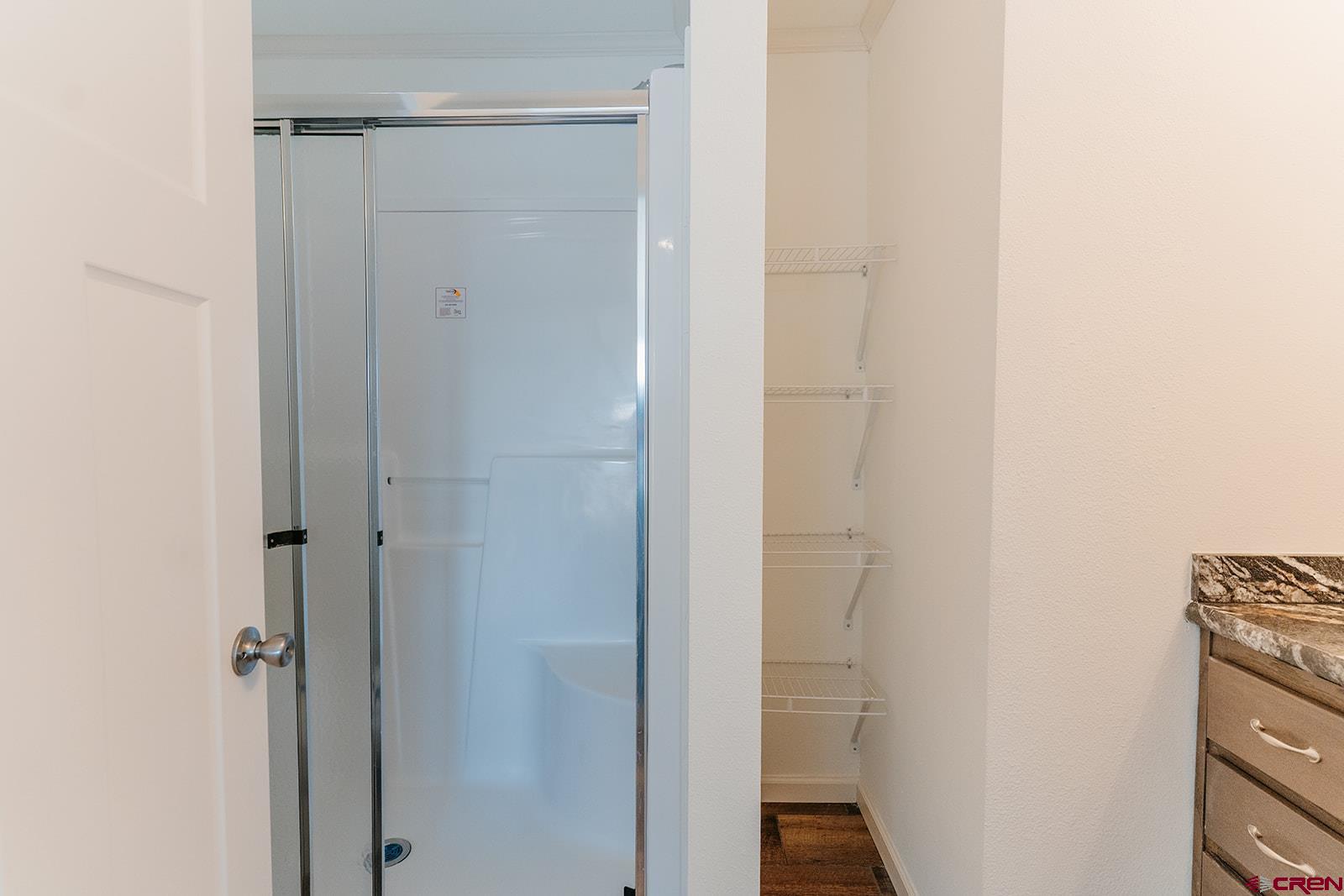 62650 Lasalle Road, Unit 820 Montrose, CO 81403 - Photo 21 of 29 a bathroom with a shower
