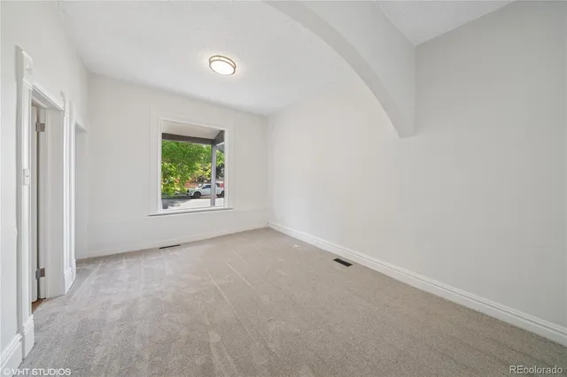 a view of a porch with a backyard