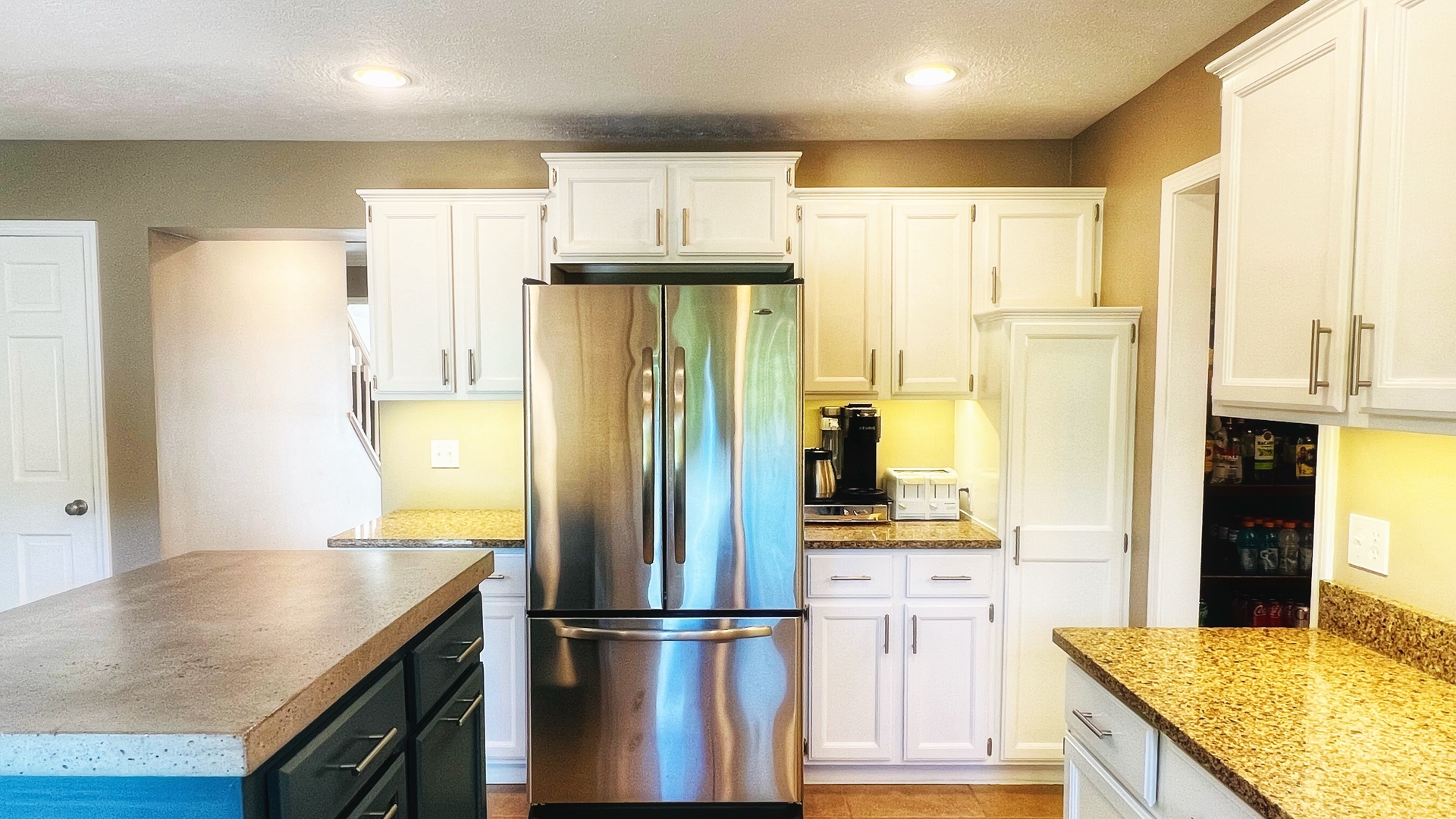 4 Downing Circle Bloomington, IL 61704 - Photo 12 of 69 a kitchen with refrigerator and cabinets