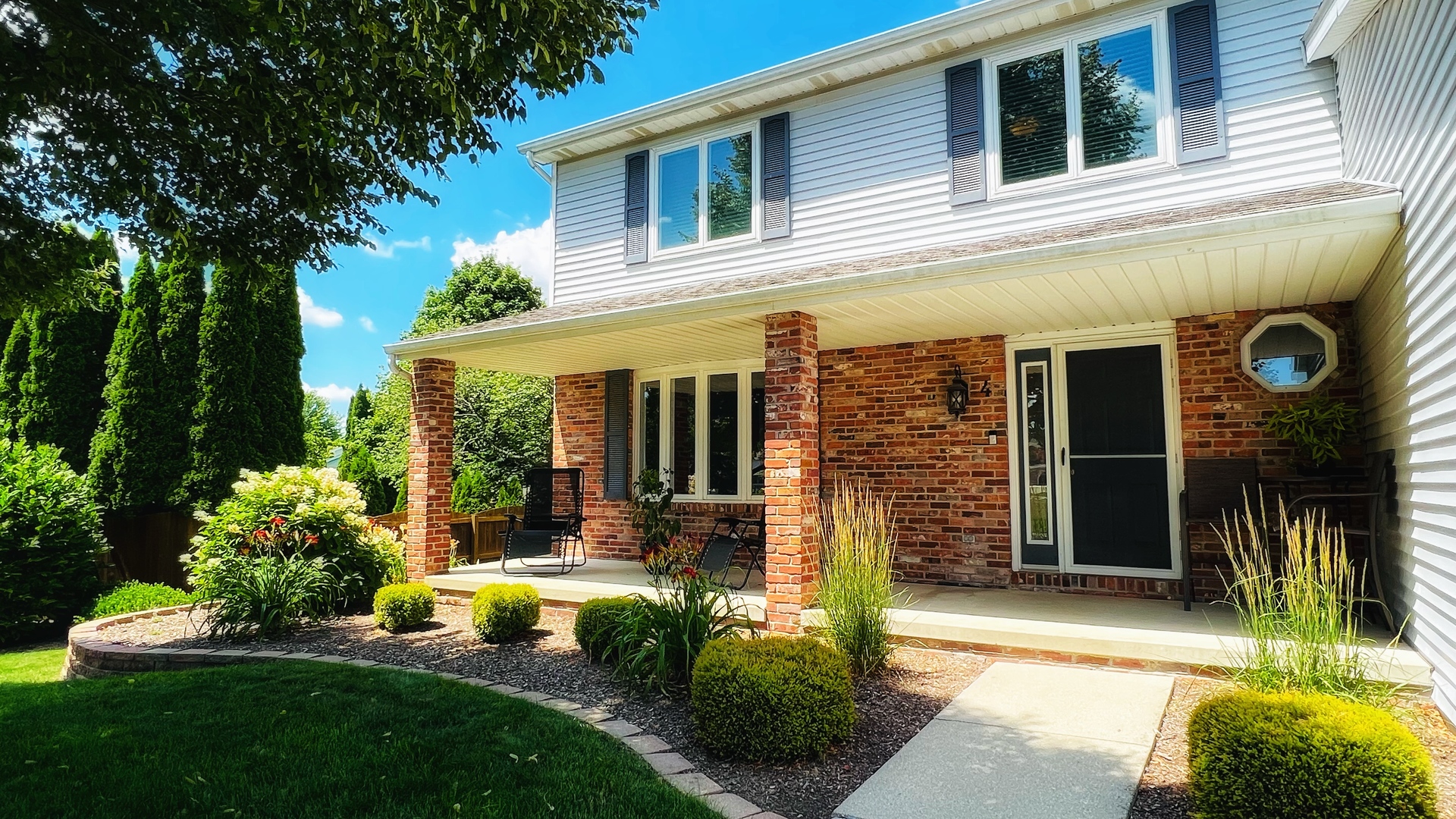 4 Downing Circle Bloomington, IL 61704 - Photo 3 of 69 a front view of a house with a yard