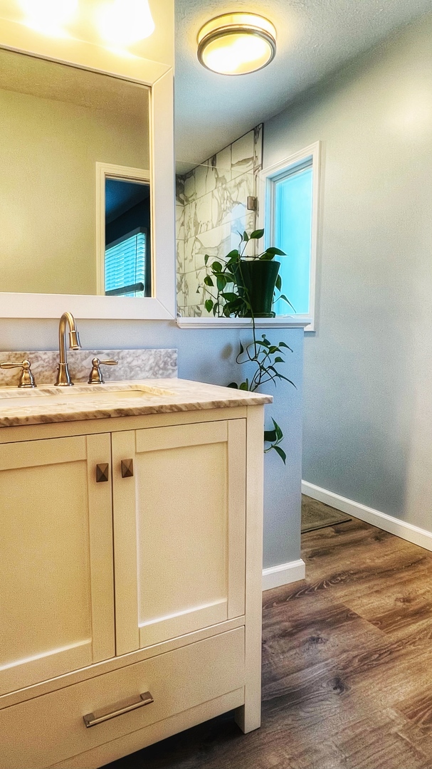 4 Downing Circle Bloomington, IL 61704 - Photo 37 of 69 a bathroom with a sink and a mirror