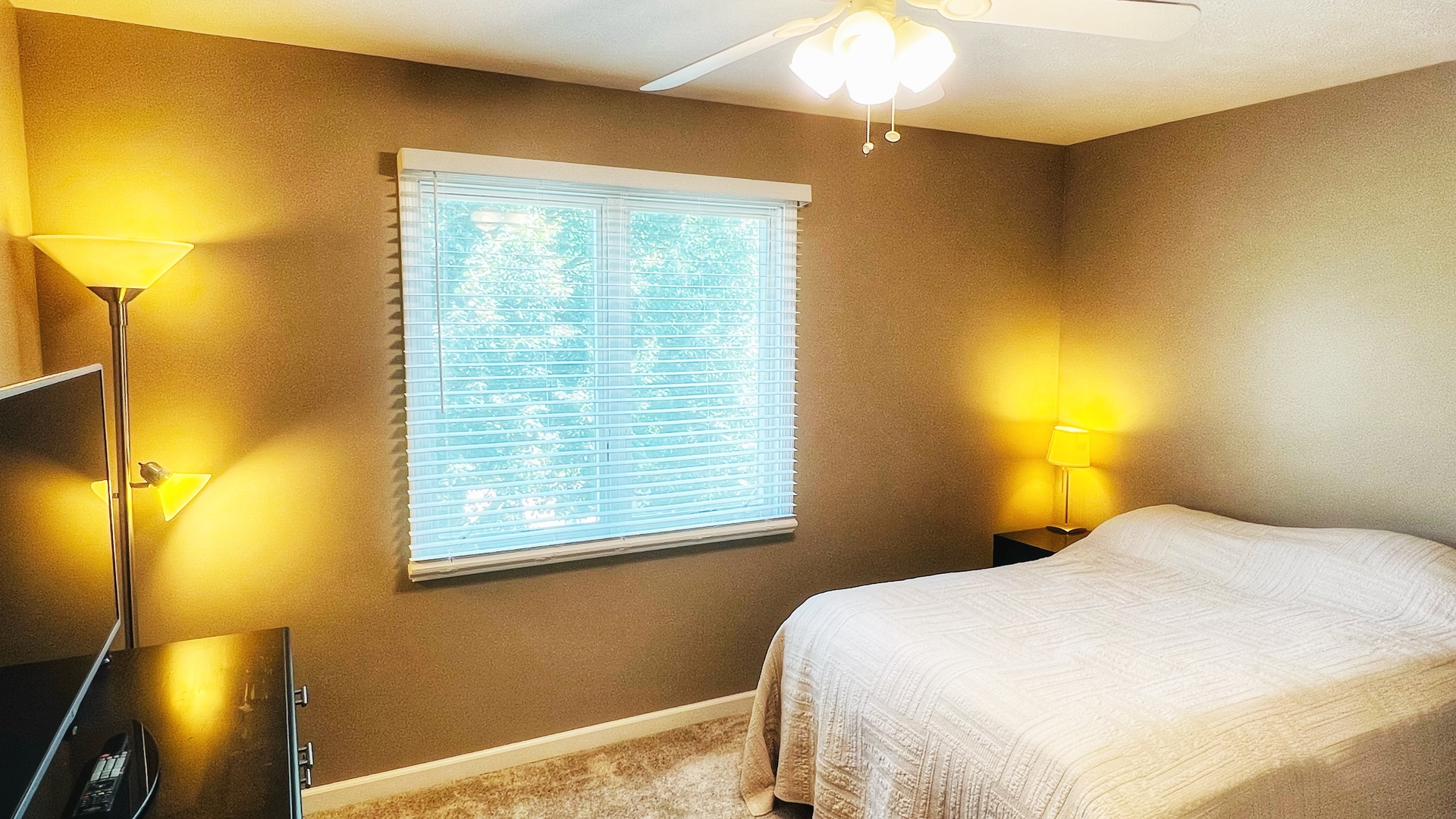 4 Downing Circle Bloomington, IL 61704 - Photo 47 of 69 a bedroom with a bed and wooden floor