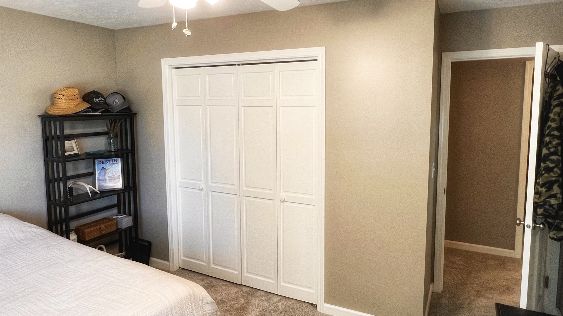 4 Downing Circle Bloomington, IL 61704 - Photo 48 of 69 a bedroom with a bed and a book shelf