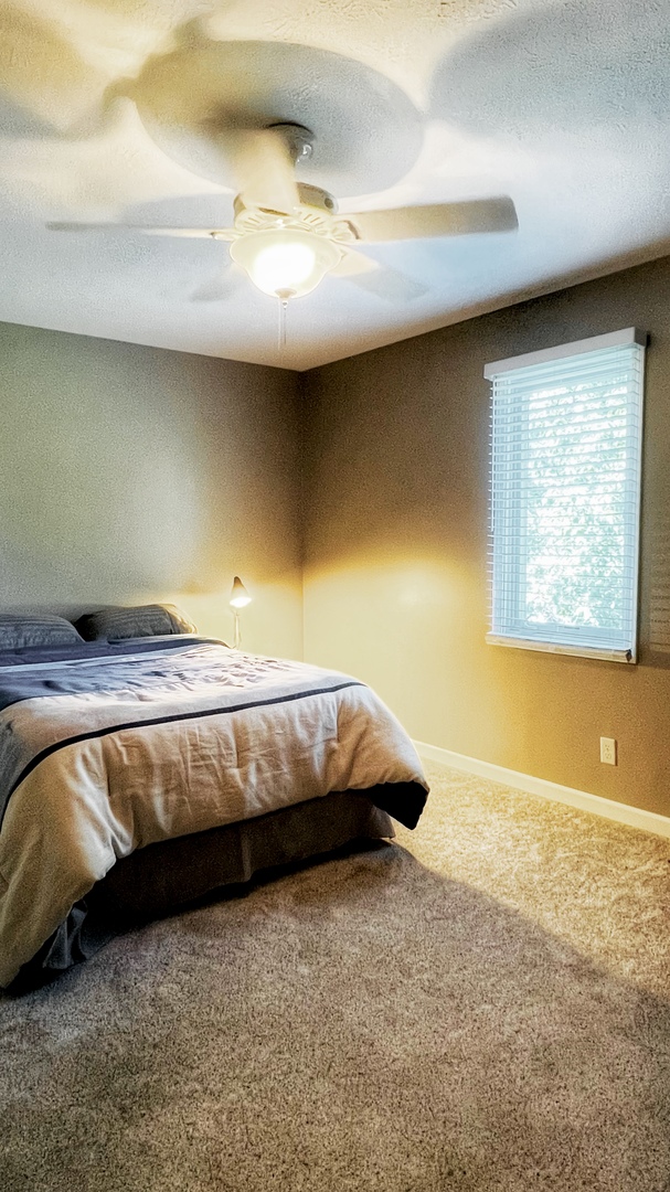 4 Downing Circle Bloomington, IL 61704 - Photo 52 of 69 a bed sitting in a room next to a window
