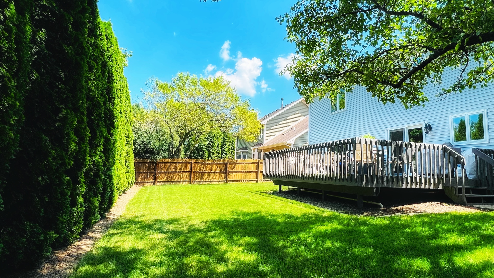 4 Downing Circle Bloomington, IL 61704 - Photo 6 of 69 a view of a backyard with a garden