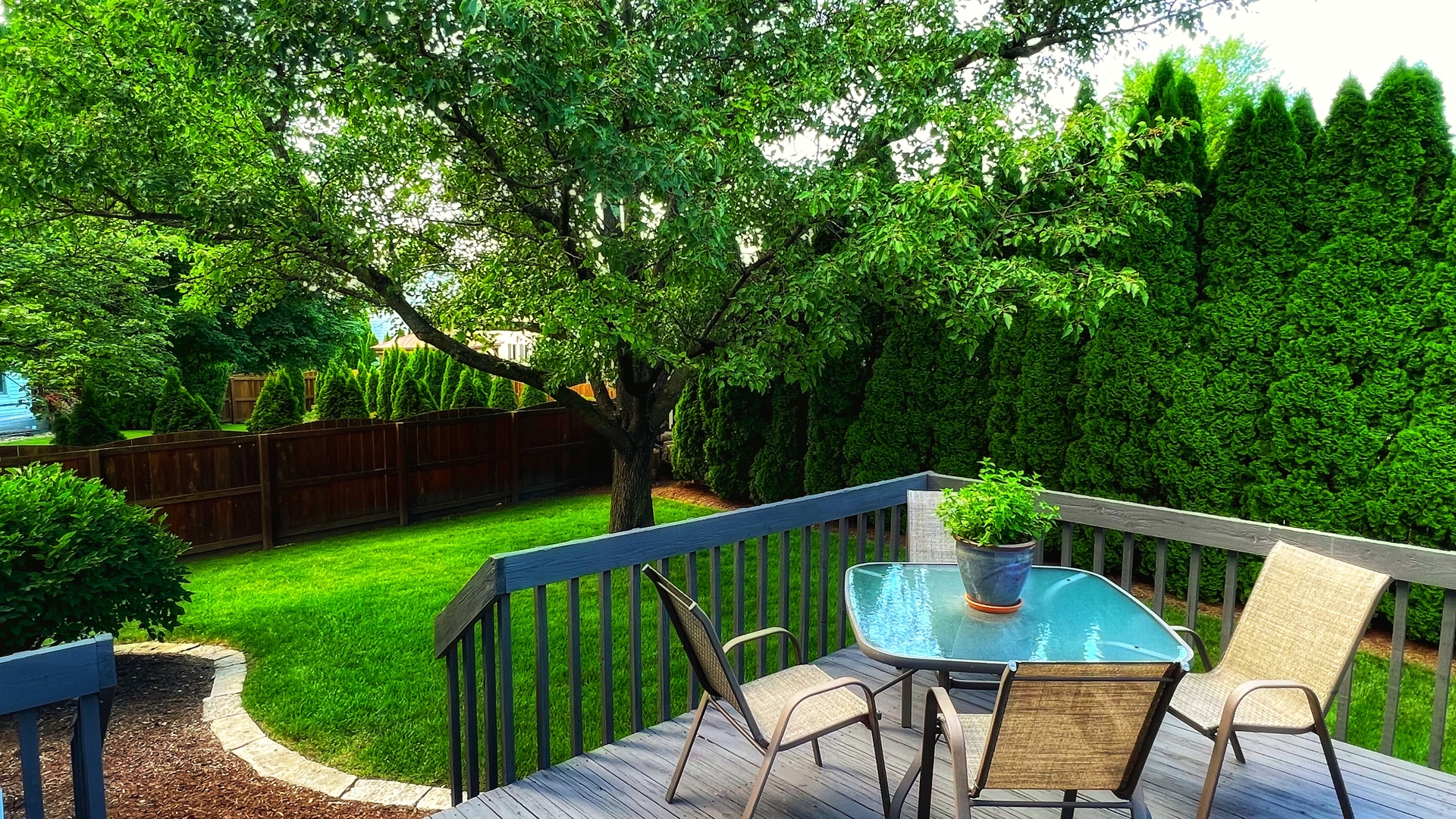4 Downing Circle Bloomington, IL 61704 - Photo 61 of 69 a view of an chair and table in the patio