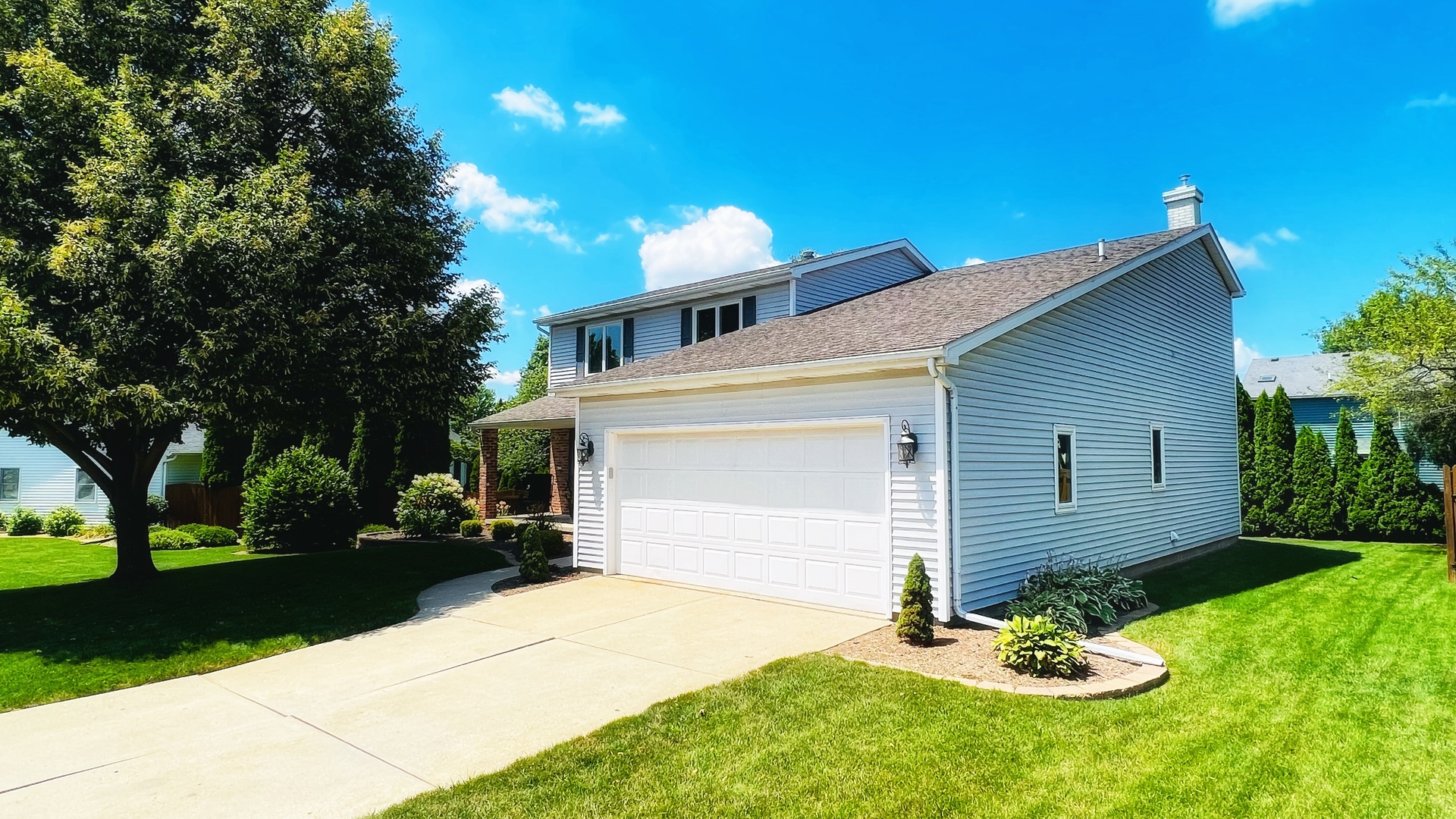 4 Downing Circle Bloomington, IL 61704 - Photo 66 of 69 a front view of a house with a yard