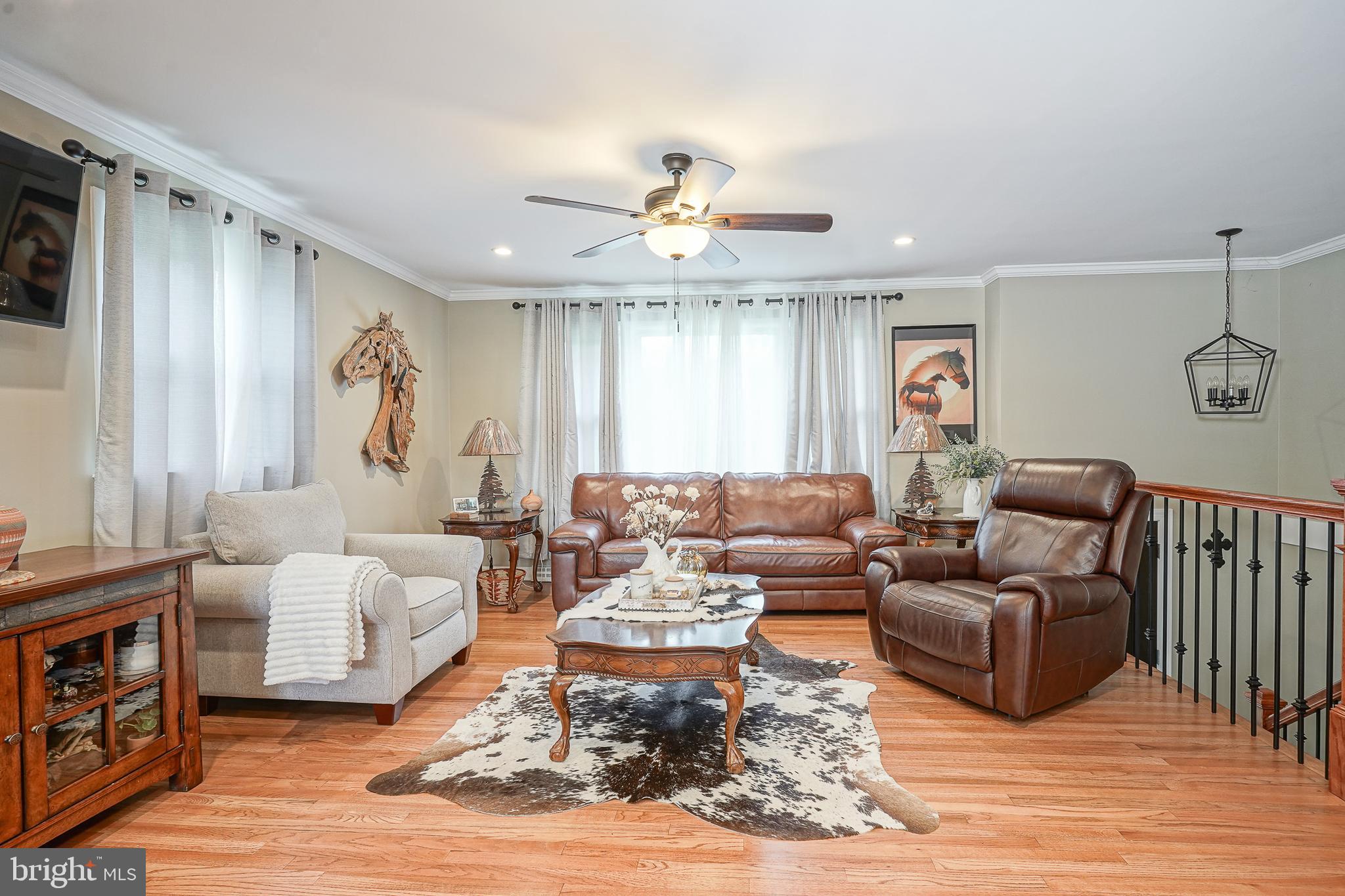 1024 Oxmead Road Eastampton, NJ 08060 - Photo 2 of 39 a living room with furniture and a chandelier