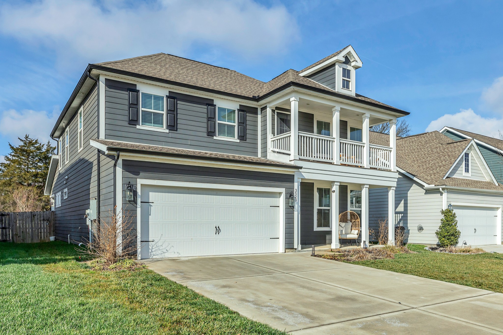 3523 Anthony Avenue Murfreesboro, TN 37129 - Photo 2 of 38 a front view of a house with a garden and garage