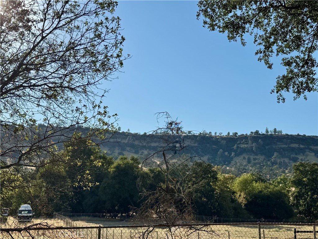 3258 Dry Creek Road Oroville, CA 95965 - Photo 2 of 6 a view of mountain with trees in the background