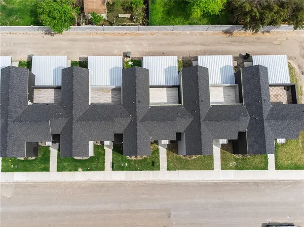 a view of a street with houses