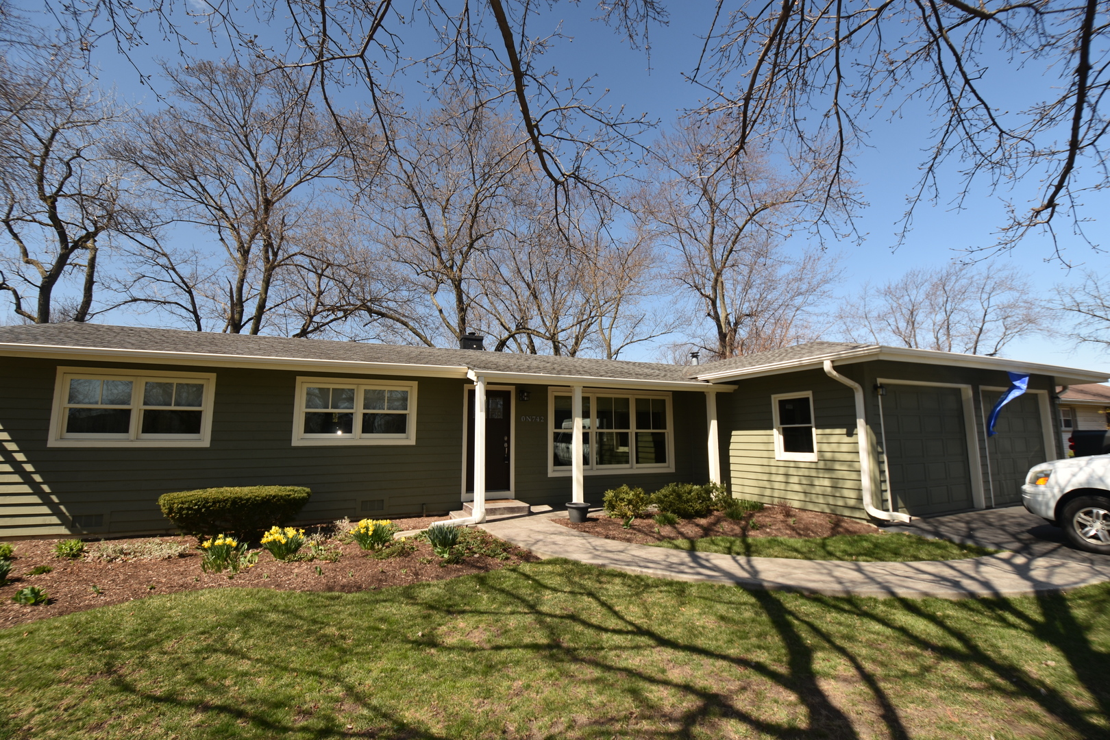 N742 Pleasant Hill Road Wheaton, IL 60187 - Photo 2 of 28 a front view of a house with yard