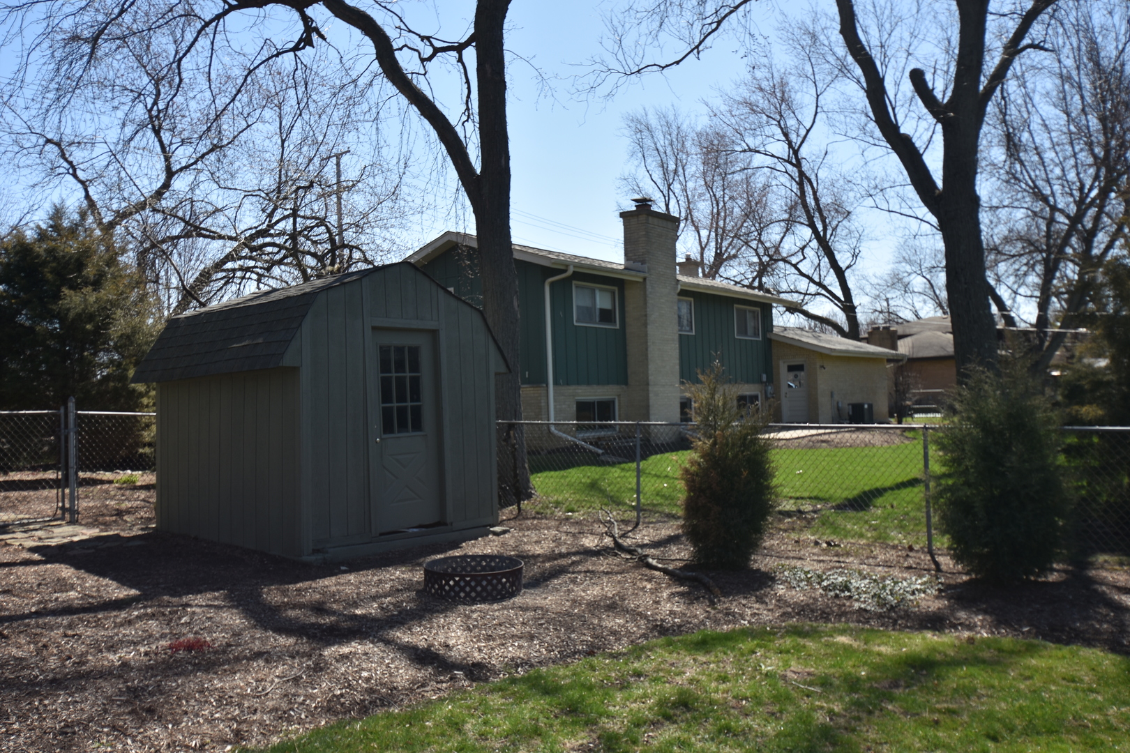 N742 Pleasant Hill Road Wheaton, IL 60187 - Photo 25 of 28 a view of a house with backyard and garden