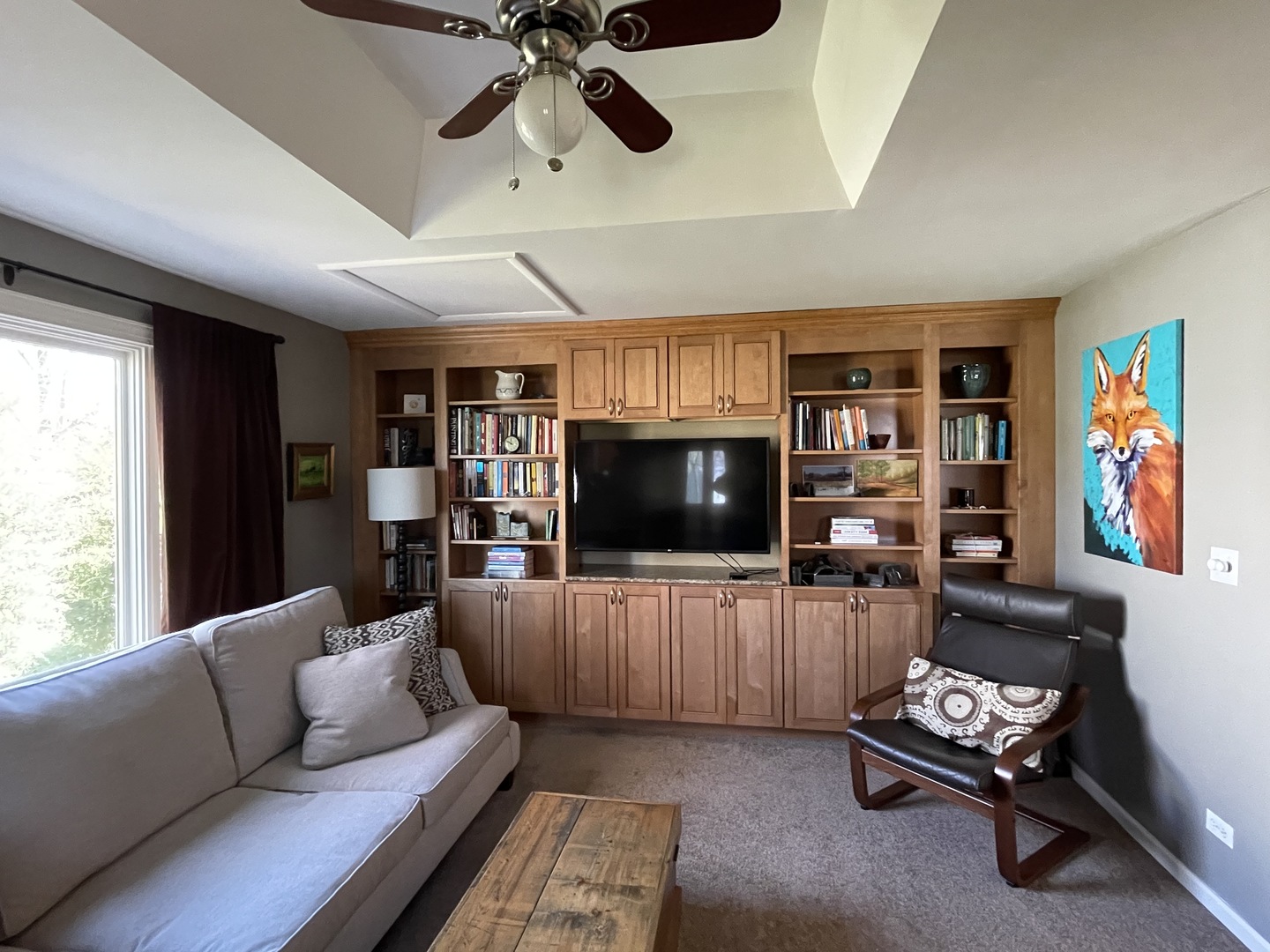N742 Pleasant Hill Road Wheaton, IL 60187 - Photo 6 of 28 a living room with furniture and a flat screen tv