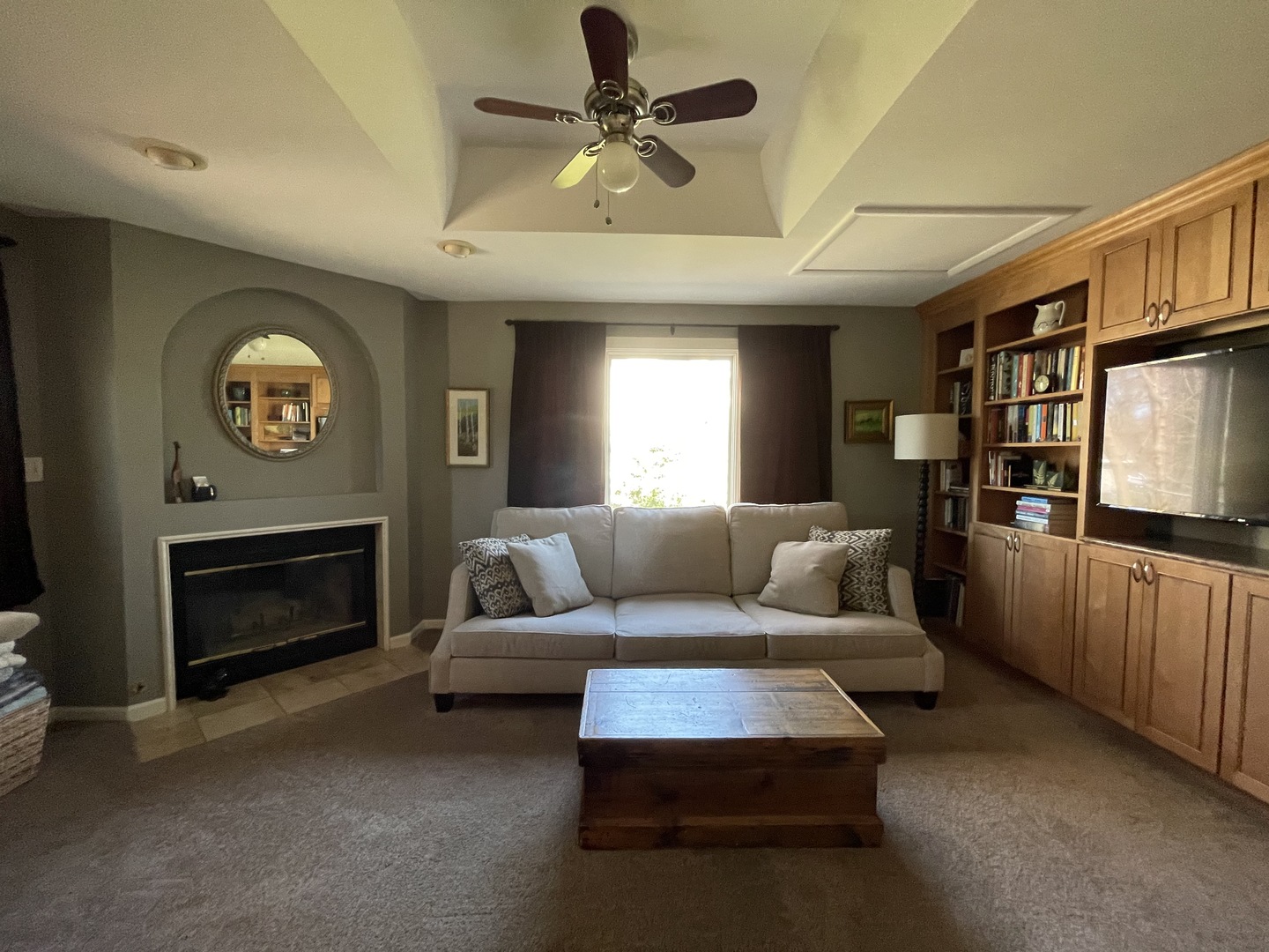 N742 Pleasant Hill Road Wheaton, IL 60187 - Photo 7 of 28 a living room with furniture a fireplace and a chandelier