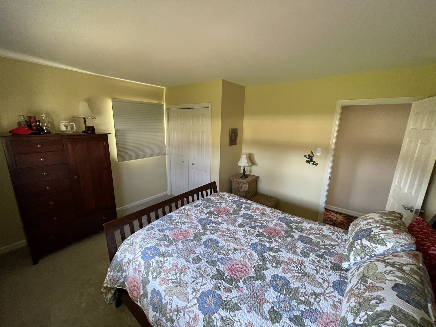 N742 Pleasant Hill Road Wheaton, IL 60187 - Photo 8 of 28 a bedroom with a bed and a mirror on dresser
